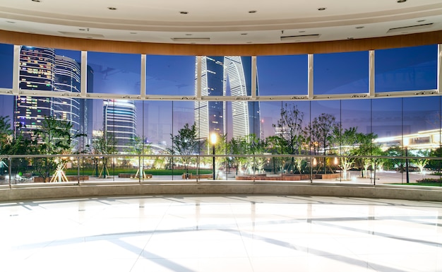 Office building glass and city skyline