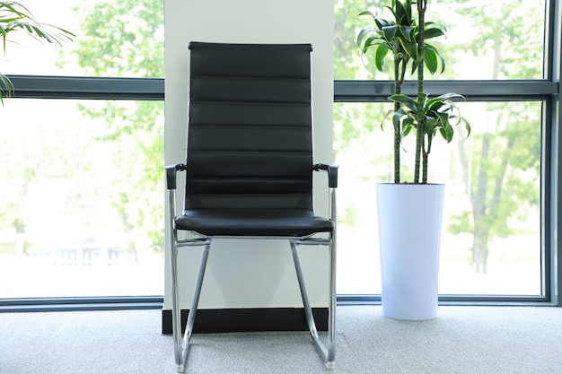 Office chair in the lobby of a modern office building stock photo