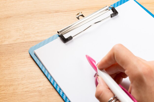 Office clipboard on the table close up