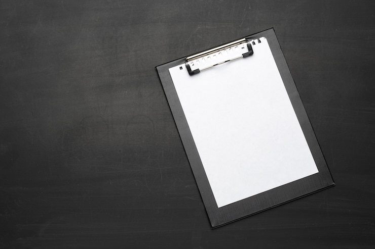 Photo office clipboard on the table close up