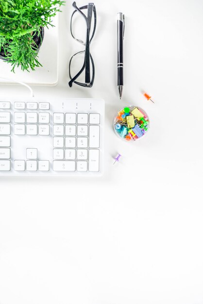 Office creative desk with supplies and coffee cup