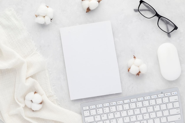 Office desk table top view with office supply, white table with copy space, White color workplace composition, flat lay