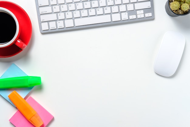 Office desk table with keyboard cup pencil headphones