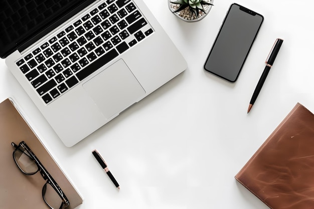 Office desk table with laptop smartphone and coffee cup Top view with copy space