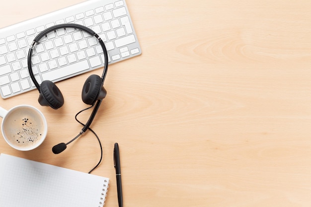 Office desk with headset and pc