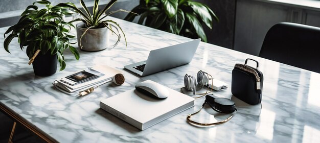 Photo an office desk with a laptop phone and plants