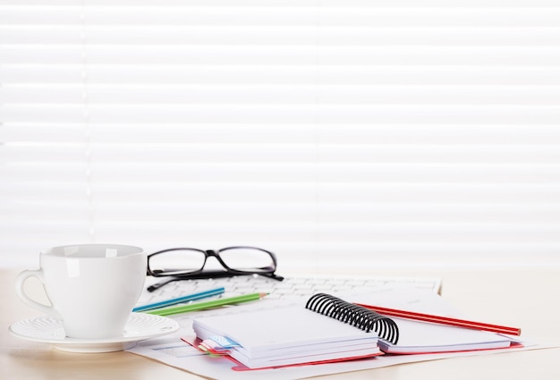 Office desk workplace with supplies