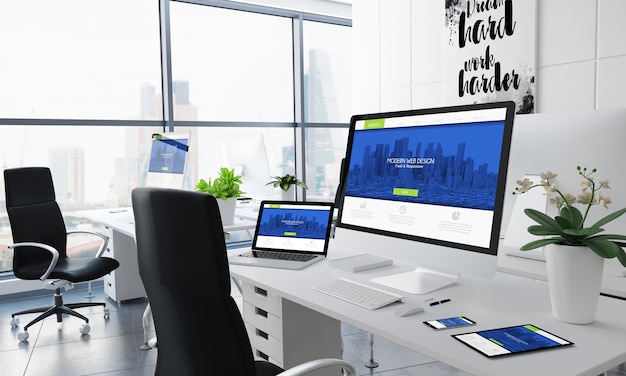 Office desktop 3d rendering with modern website design on screen