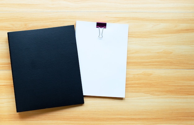 Photo office folder on wooden table background