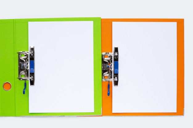 Office folders with paper on white background. Top view