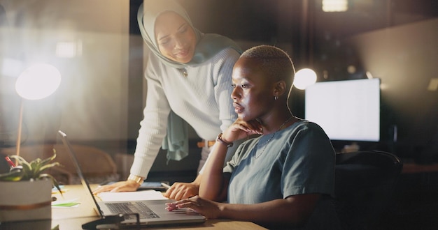 Office night diversity laptop and happy woman review social network feedback customer experience or ecommerce Brand monitoring data teamwork and media team collaboration on online survey analysis