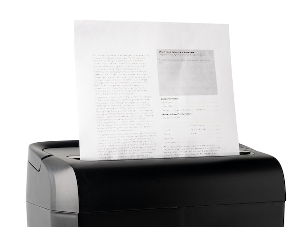 Photo office paper shredder on table against gray background