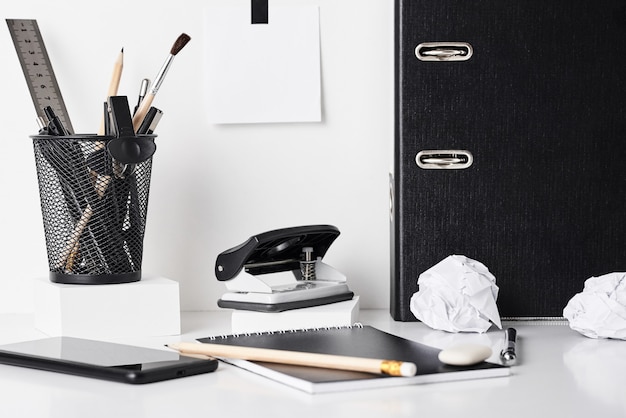 Office supplies on white background