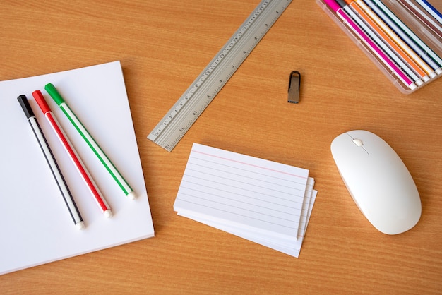 Office supplies on the wooden desk