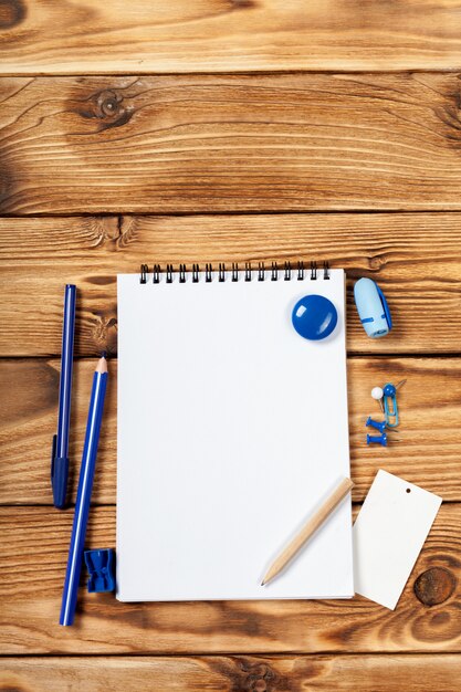 office supplies on wooden table