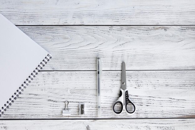 Office supplies for work sales and study on a wooden background