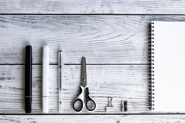 Photo office supplies for work sales and study on a wooden background