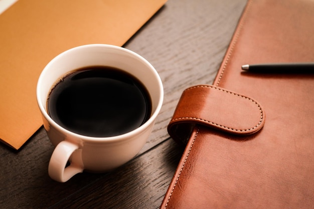 Office table desk and coffee cup productivity concept