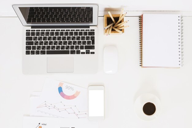 Office table with electronic devices