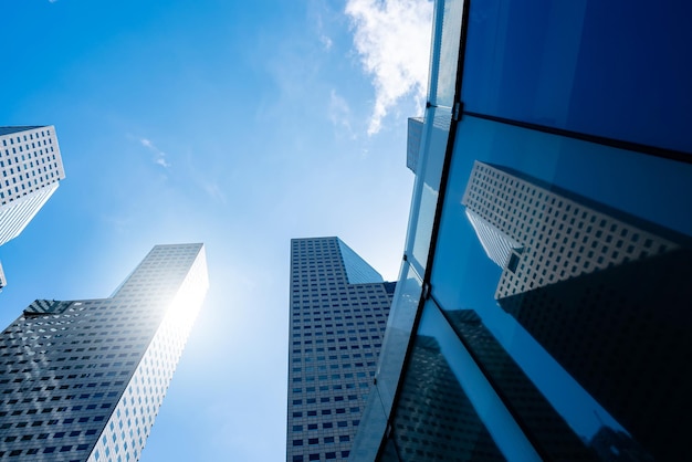 Office tall building Low angle view of skyscrapers modern office building city in business center with blue sky