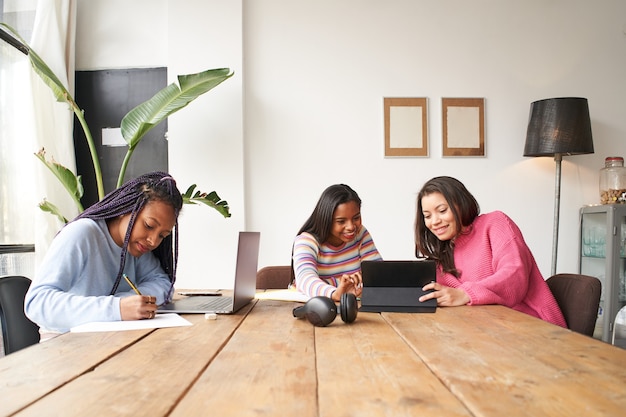 In the office three businesswomen work together