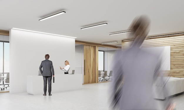 Office with reception desk and three people