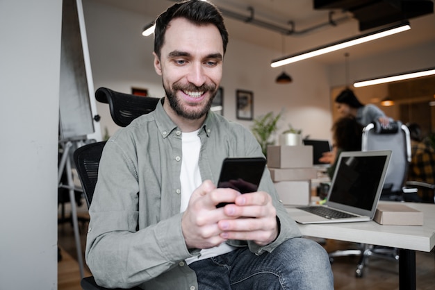 Office worker chatting online using the Internet