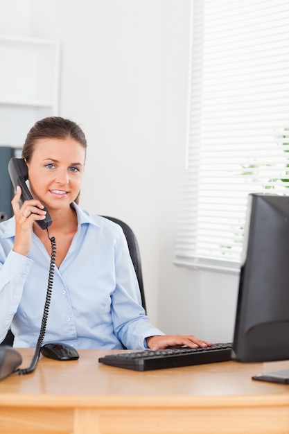 Office worker making a phone call