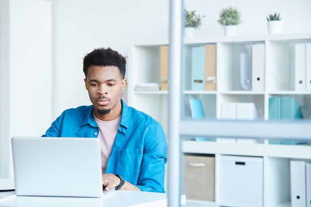 Office worker using laptop