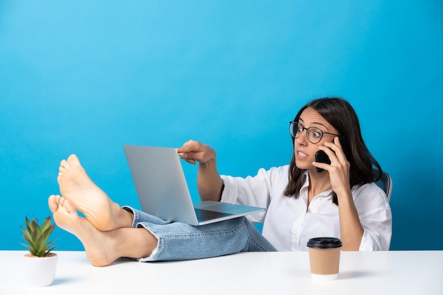 Office worker working feet on desk