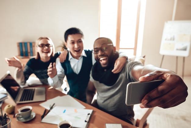 Office Workers Celebrating Success Take Photo