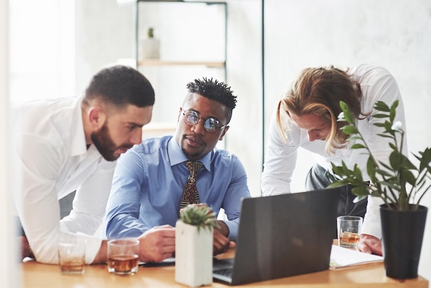 Office workers having conversation during their job