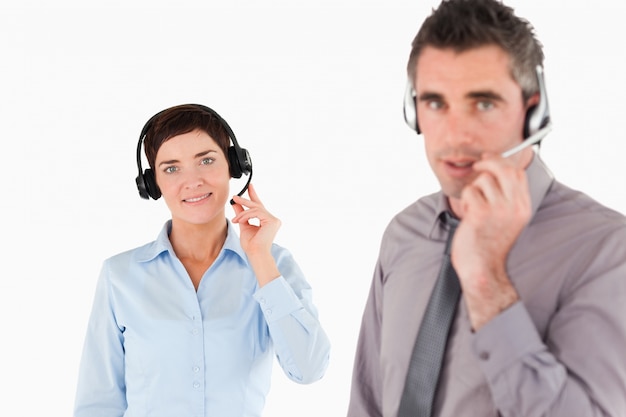 Office workers using headsets