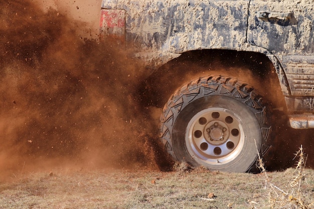 Offroad racing on dusty terrain