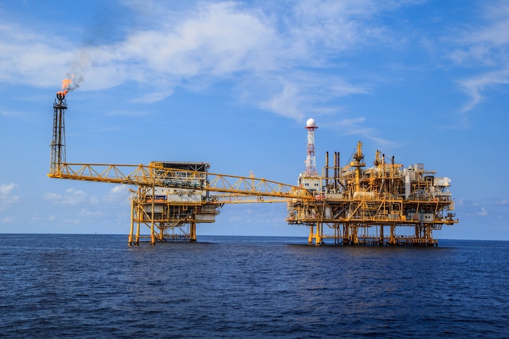 Photo offshore oil and gas production and exploration business. production oil and gas plant and main construction platform in the sea. energy business