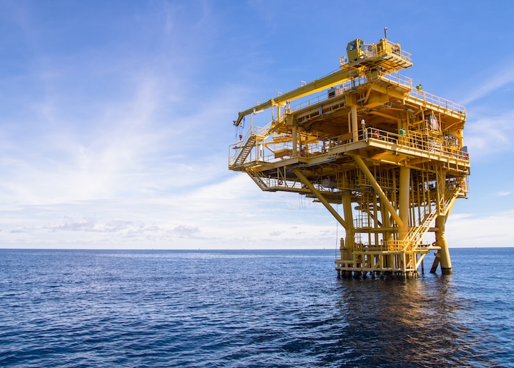 Photo offshore production platform in the sea for oil and gas production.