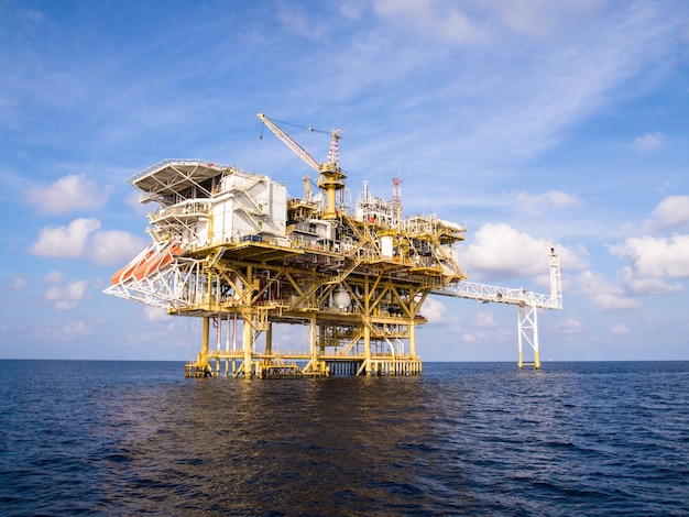 Photo offshore production platform in the sea for oil and gas production.