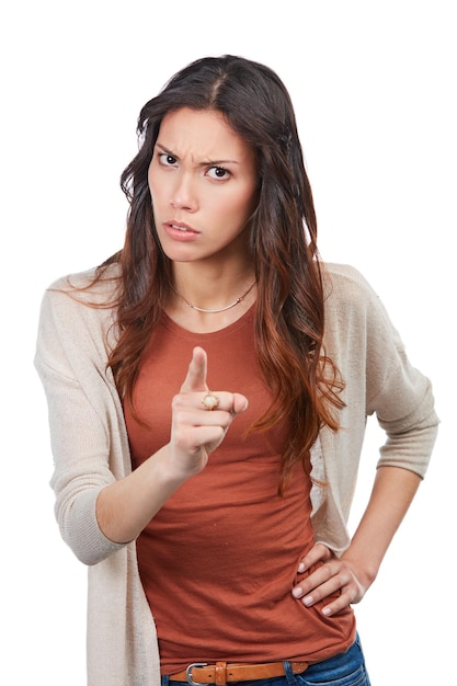 Oh no you dont Portrait of an angry young woman wagging her finger in studio