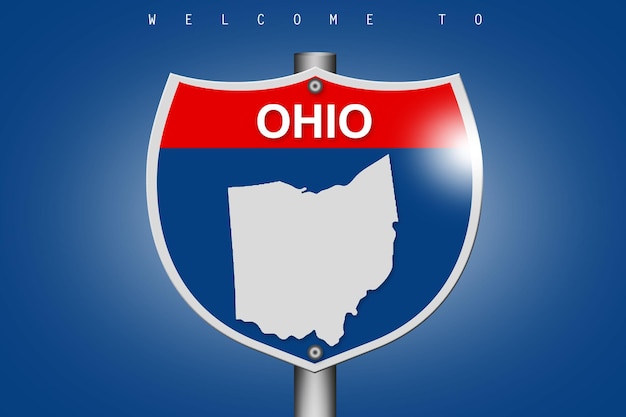 Photo ohio map on highway road sign over blue background