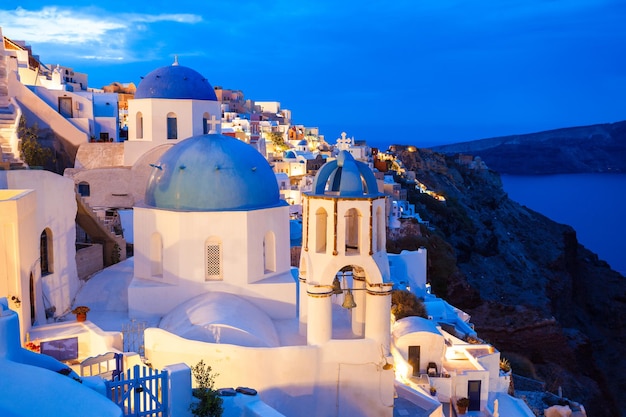 Oia Church dome in the Oia town at sunset, Santorini island in Greece