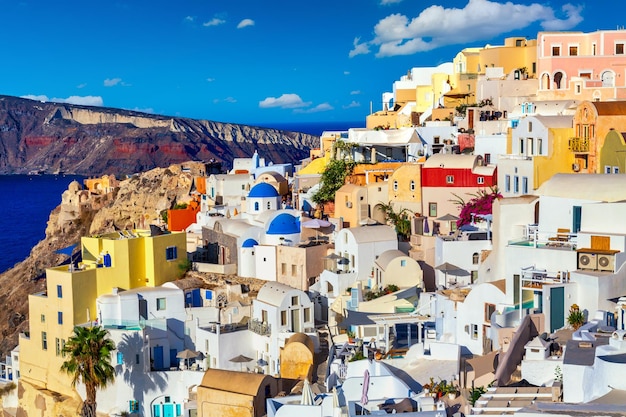 Oia village with famous white houses and blue churches on Santorini island Aegean sea Greece