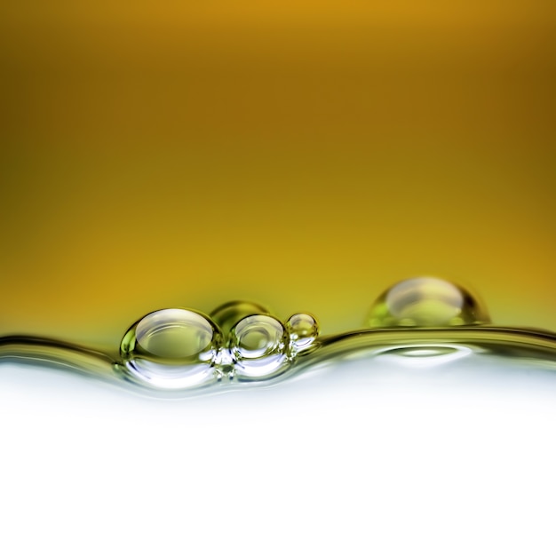 Oil background with bubbles of air closeup