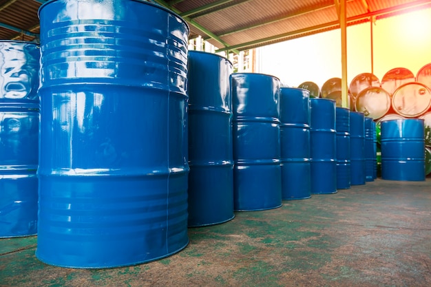 Oil barrels blue or chemical drums horizontal stacked up