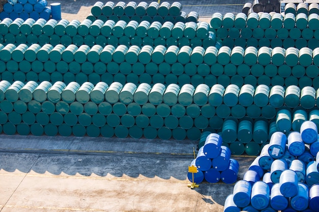 Oil barrels green or chemical drums horizontal stacked up