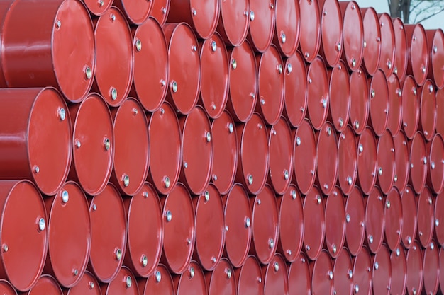 Oil barrels red or chemical drums stacked up