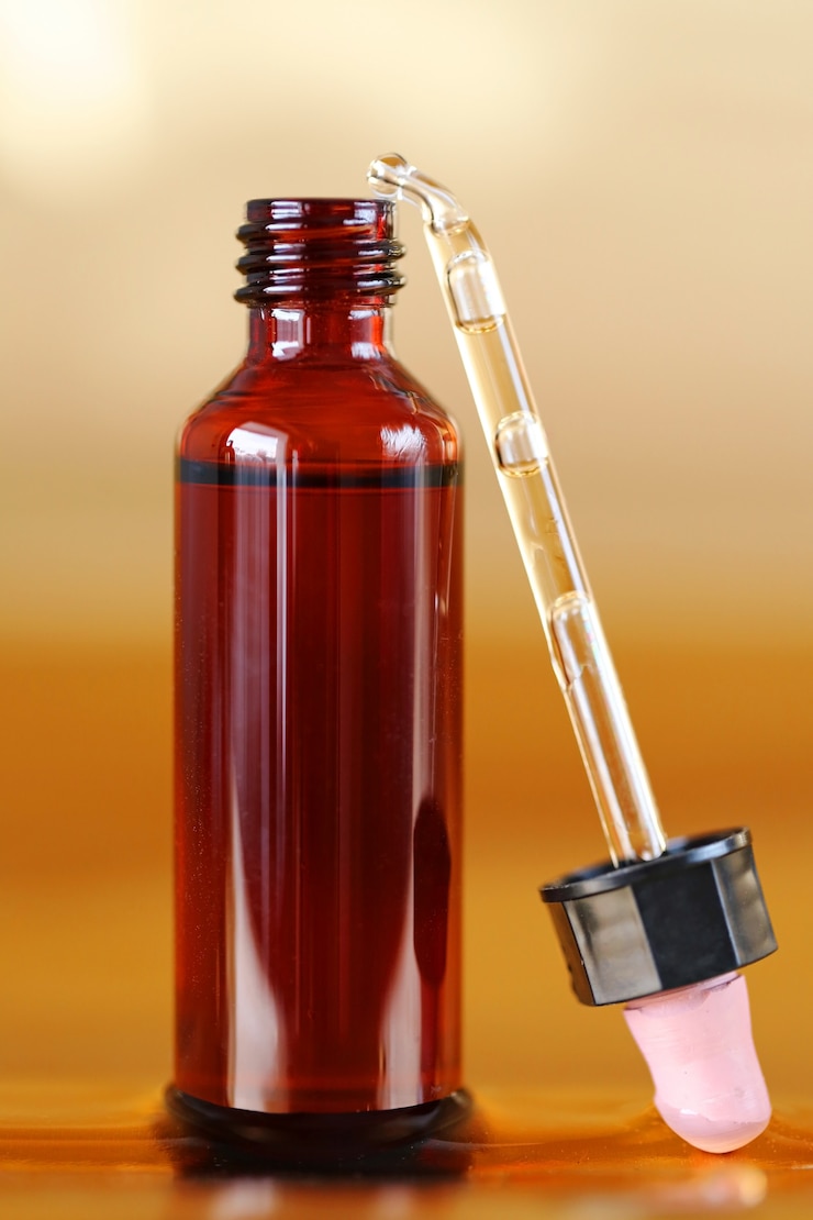 Photo oil in brown bottle