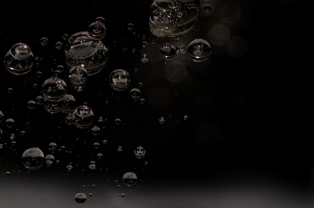 Oil droplets on black