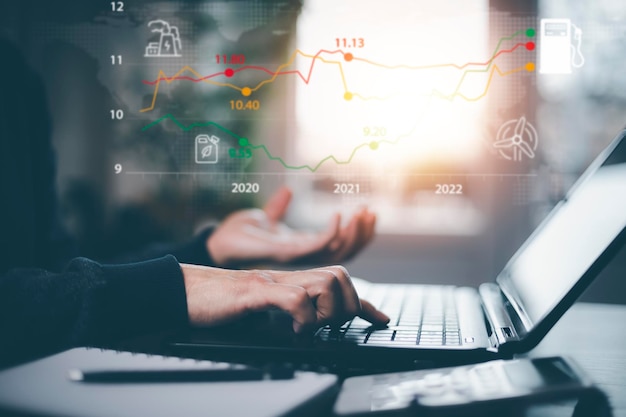 Oil energy graph of the world market impact on the economy\
conceptbusinessman touch chart with the indicator on the oil price\
slide at gas station fluctuations in oil prices and exchange\
trade