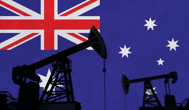 Photo oil and gas industry background oil pump silhouette against an australia flag d rendering