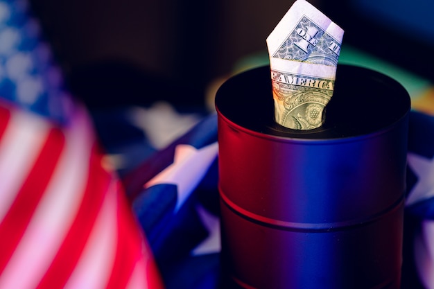 Oil industry crisis concept. Oil barrel with american dollar